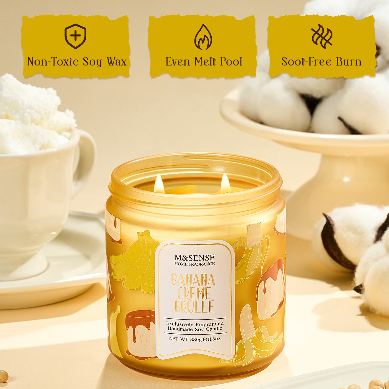 Candle labeled 'Banana Cèreme Butè' with product features on a neutral background