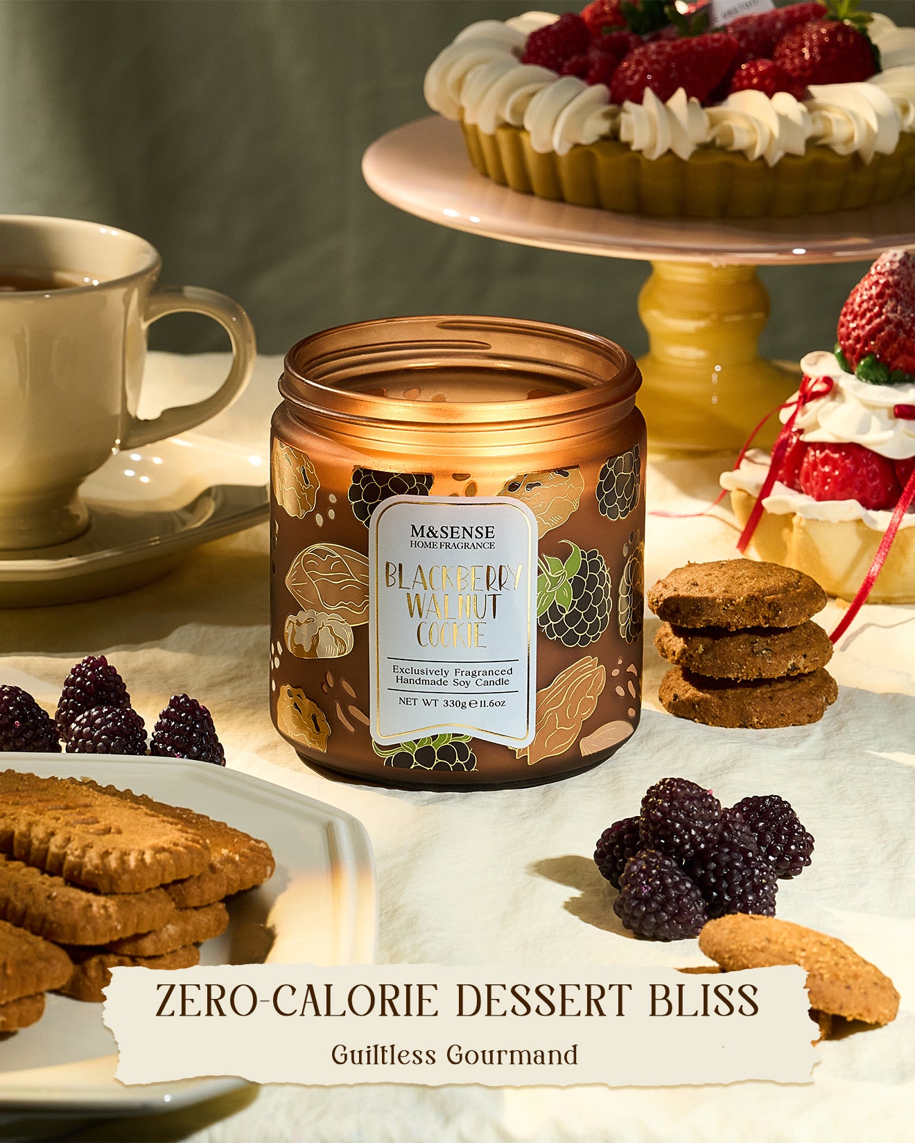Candle jar labeled 'Blackberry White Chocolate' on a table with desserts and cookies.
