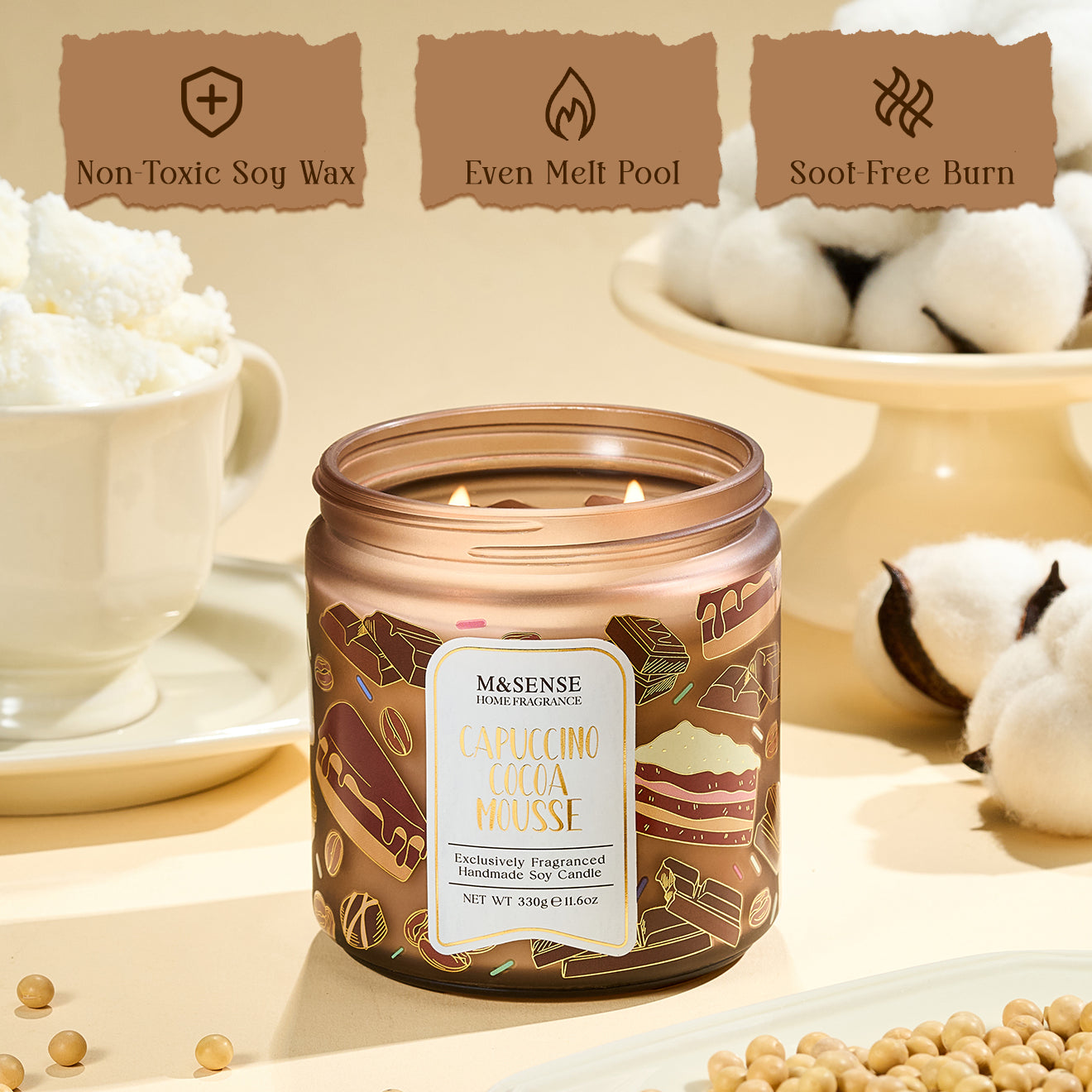 Candle jar with decorative label on a neutral background with cotton and soybeans.