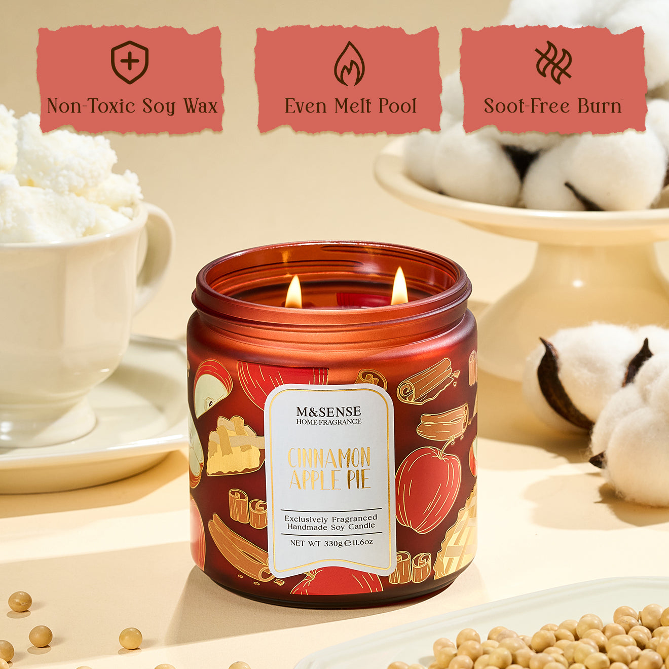 Candle with a label on a table with cotton and soybeans, featuring text about burn characteristics.