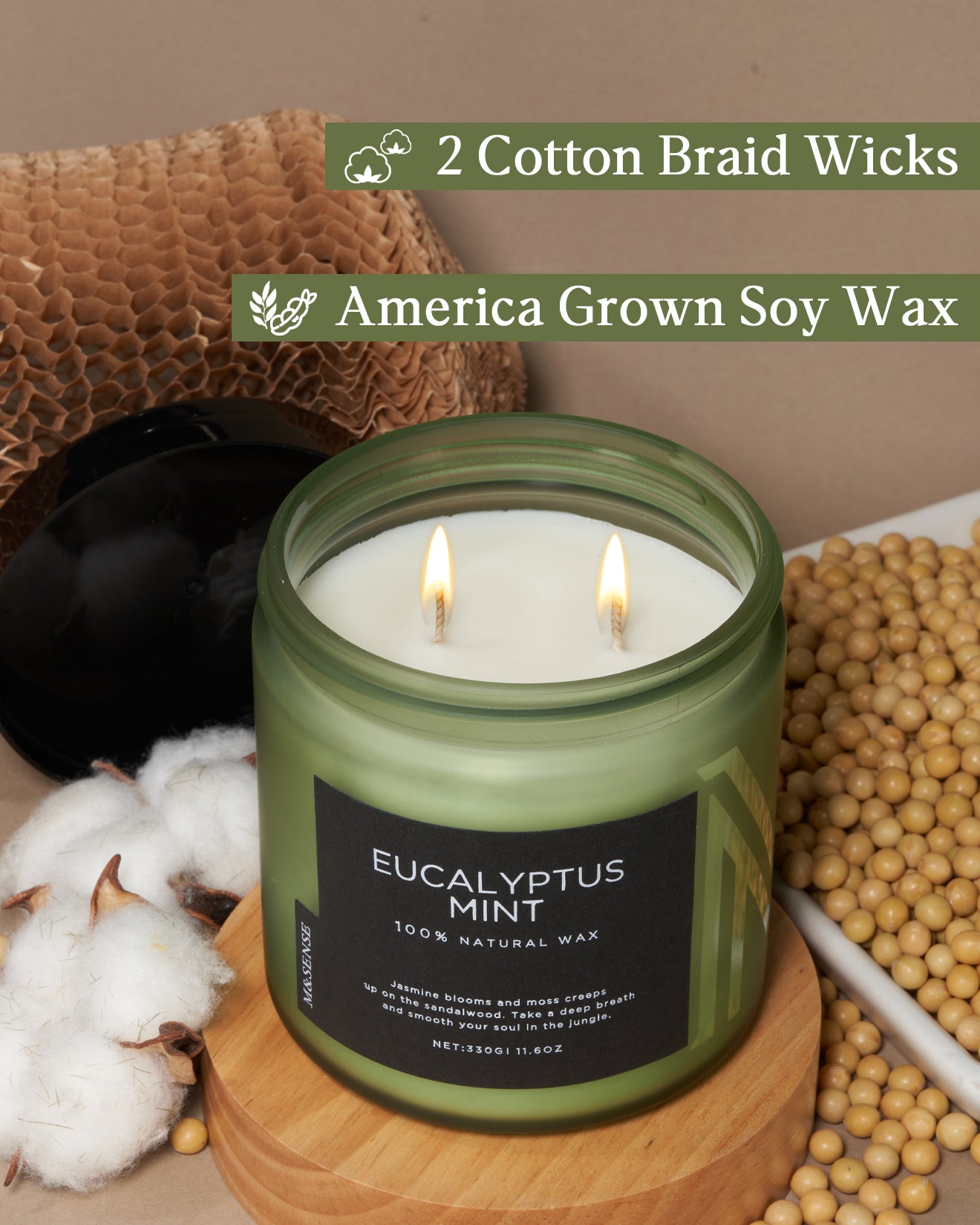 Eucalyptus mint soy wax candle in a green jar, shown with raw cotton, soybeans, and recyclable packaging to highlight natural, non-toxic ingredients.