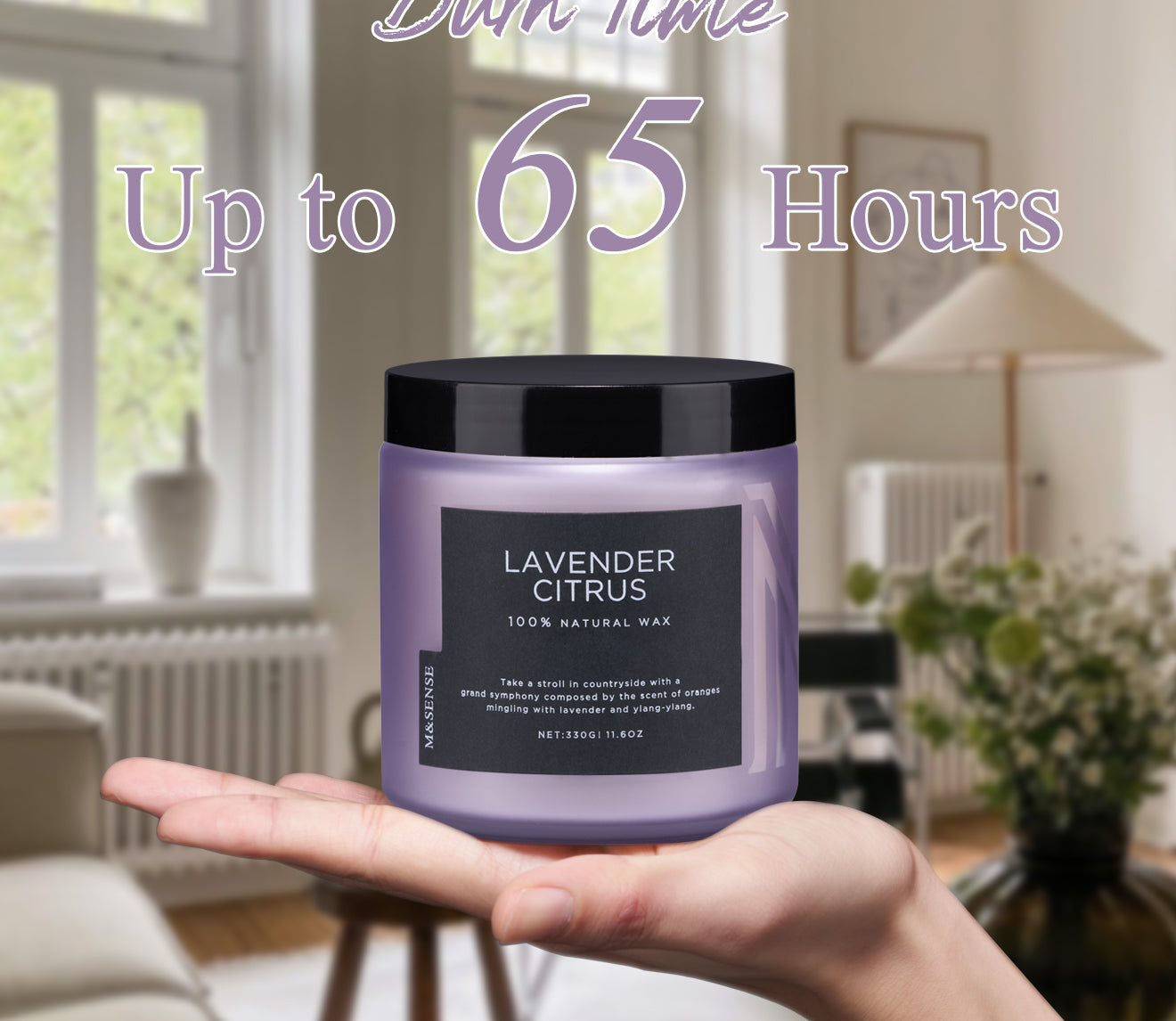 Hand holding an 11.6oz Lavender Citrus candle with a 65-hour burn time, showcasing its purple frosted jar.