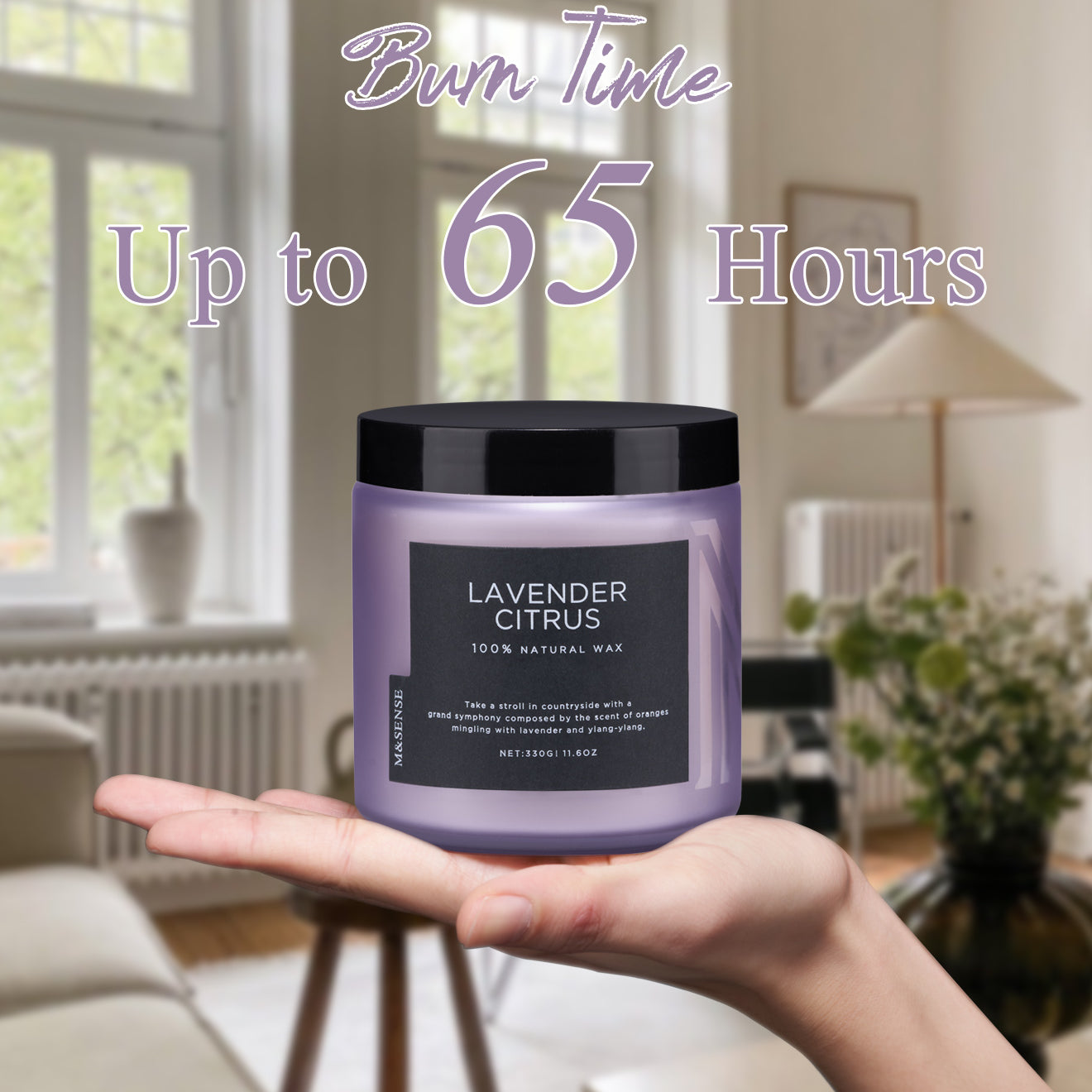 Hand holding an 11.6oz Lavender Citrus candle with a 65-hour burn time, showcasing its purple frosted jar.