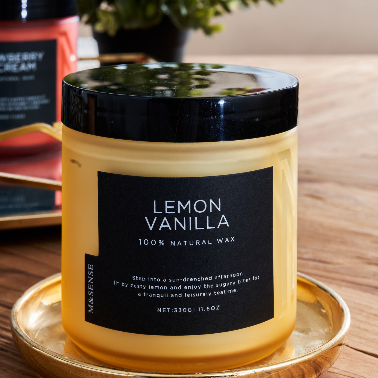 A Lemon Vanilla Candle on a wooden tabel
