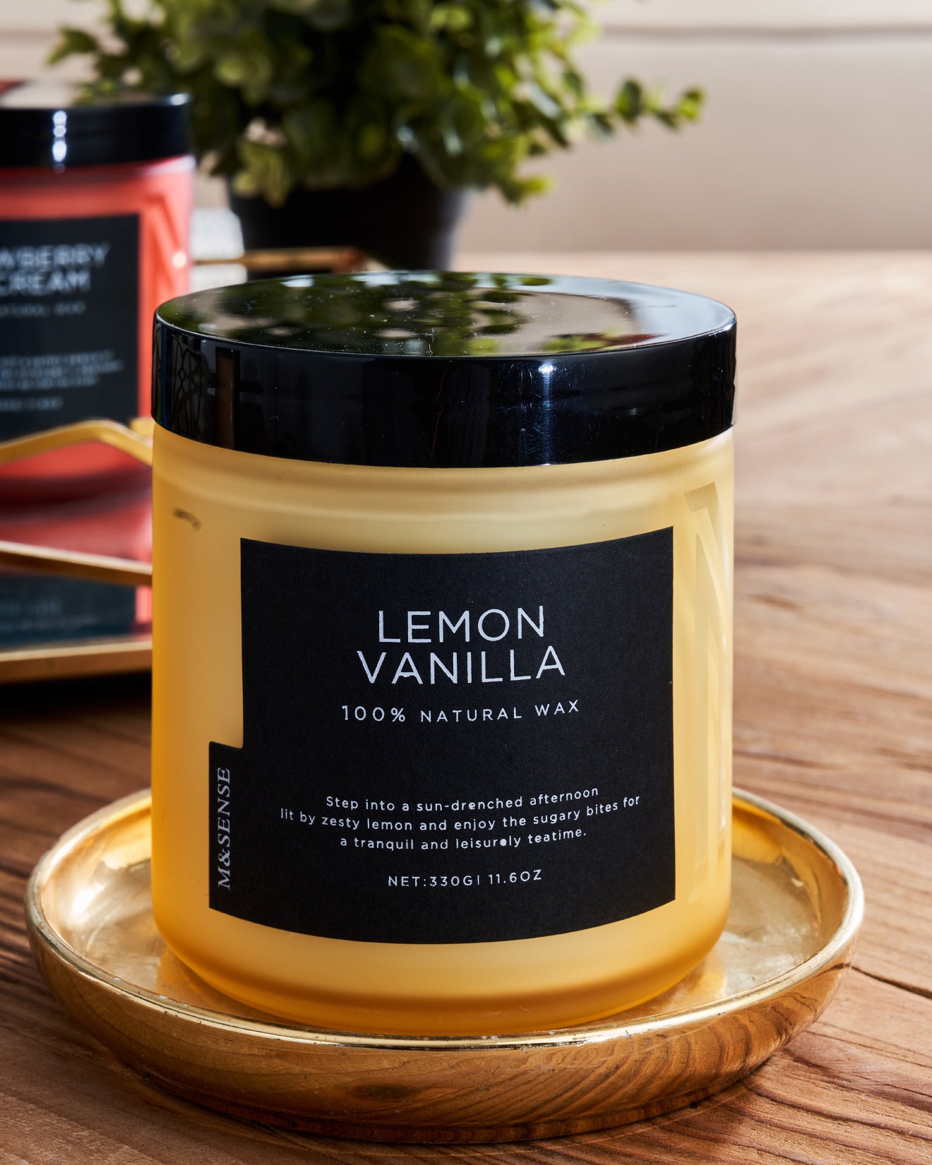 A Lemon Vanilla Candle on a wooden tabel