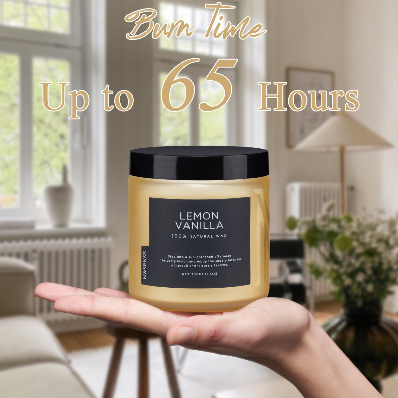 A lit lemon vanilla scented candle held in a palm, showcasing its 65-hour maximum burn time.
