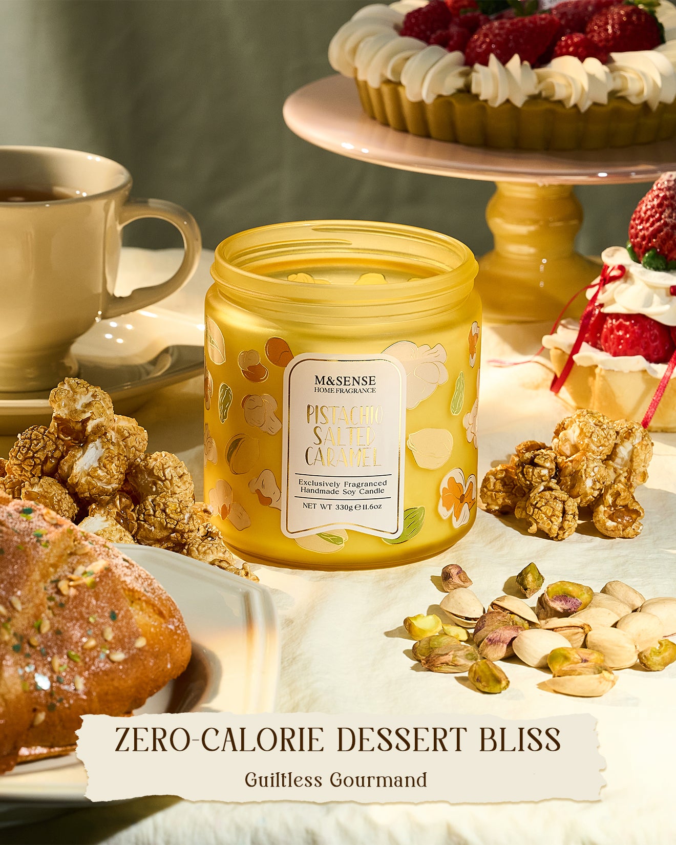 Yellow candle jar with a label on a table with desserts and snacks