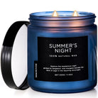 Summer's Night scented candle in a blue glass jar, labeled 100% natural wax on a white background.