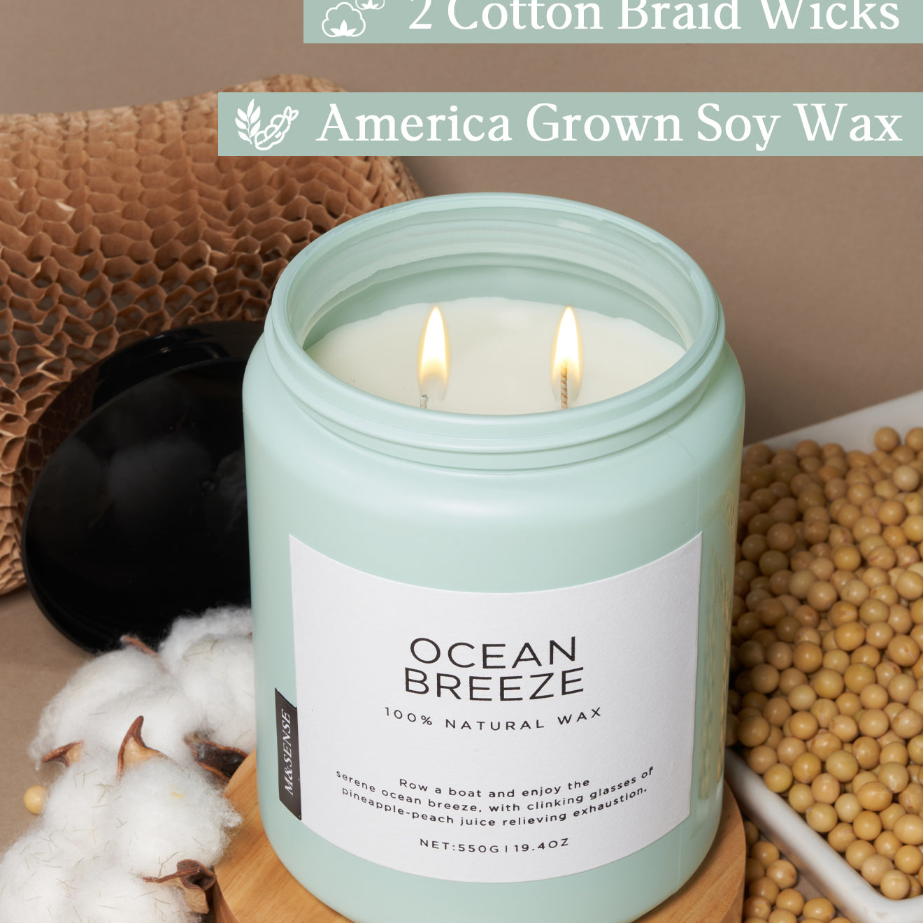 Ocean Breeze candle with soy wax and cotton wick, shown with cotton, soybeans, and recyclable packaging.