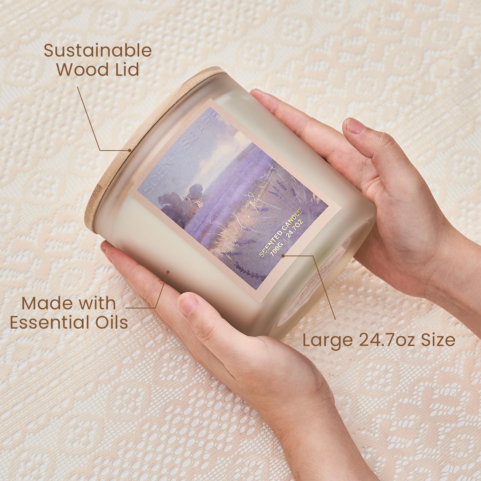 Hand holding a large 24.7oz candle with sustainable wood lid and essential oils, on a textured beige background.
