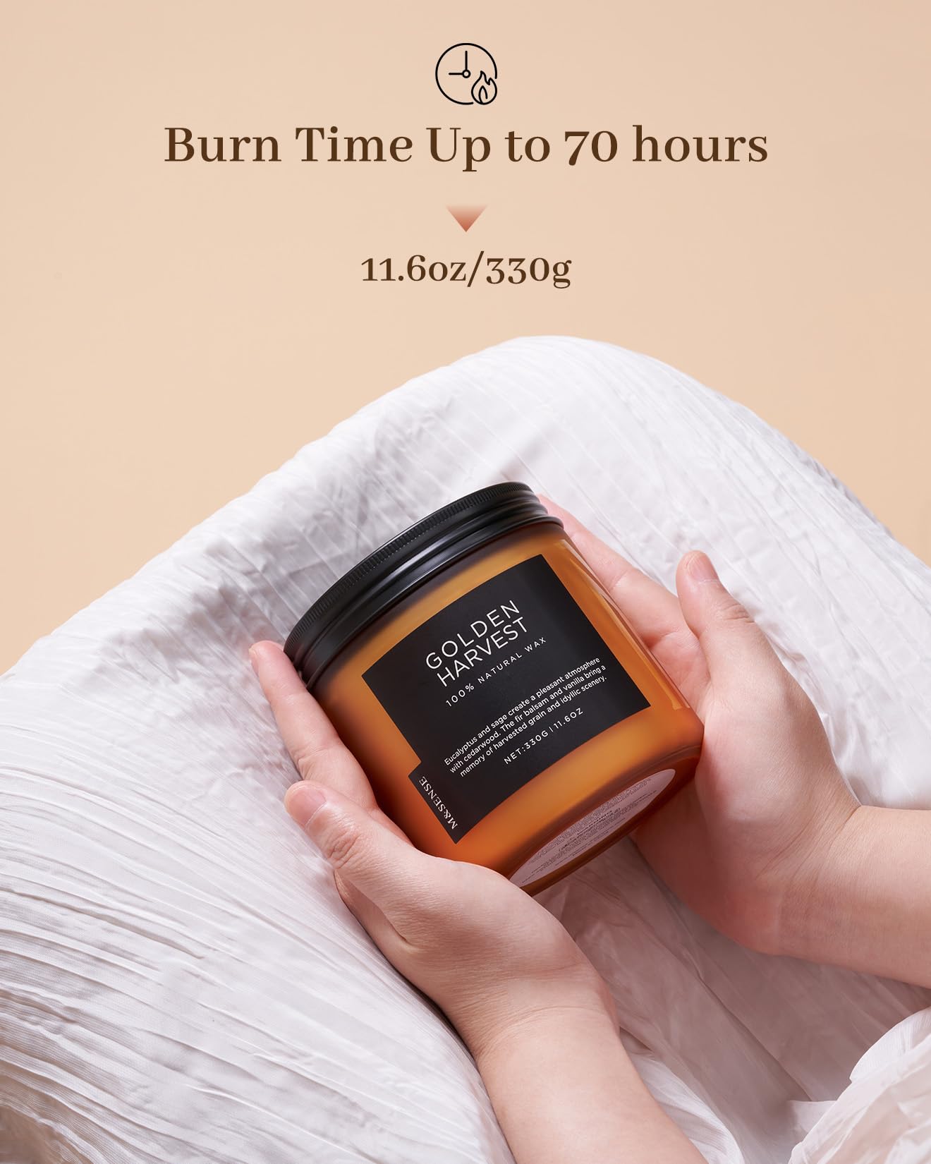 Candle jar labeled 'Golden Harvest' held by hands with text indicating burn time and weight.