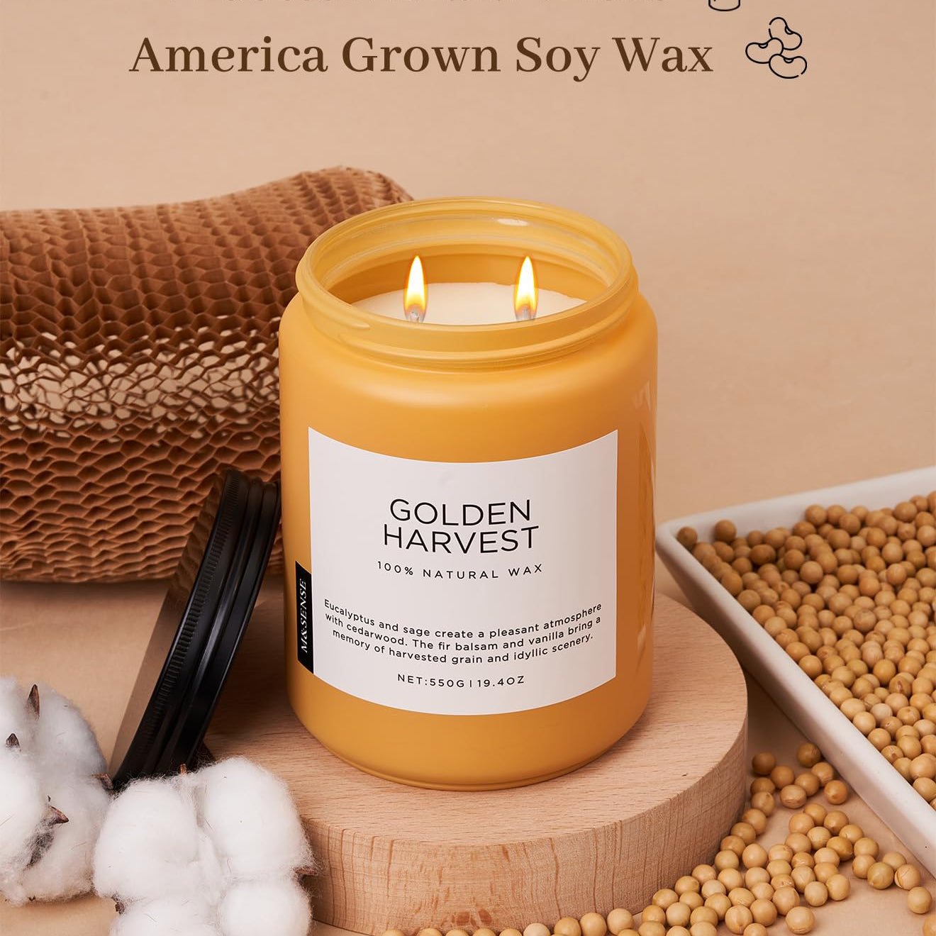 Candle labeled 'Golden Harvest' with cotton braid wicks and soy wax on a beige background