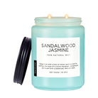 Candle in a jar labeled 'Sandalwood Jasmine' with a white label on a white background