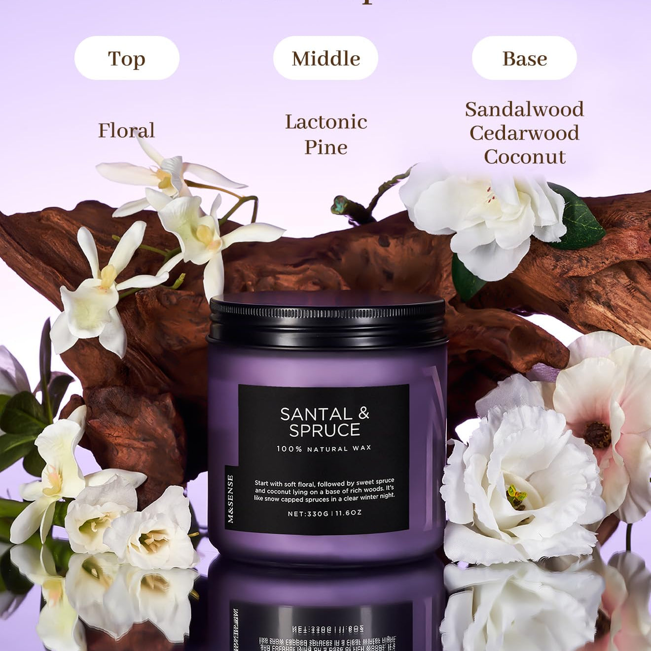 Santal & Spruce candle with floral elements on a reflective surface