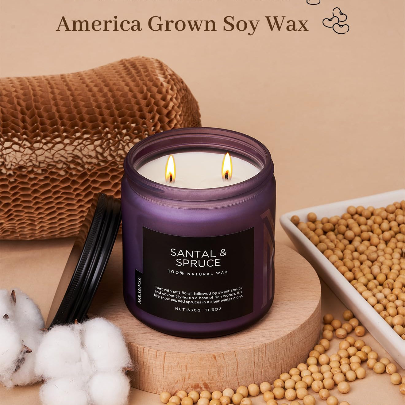 Scented candle with cotton braid wicks and soy wax, surrounded by cotton and soybeans on a beige background.