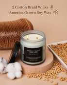 Candle with 'Snow Filled Dreams' label, surrounded by cotton, soybeans, and a woven basket on a beige background.