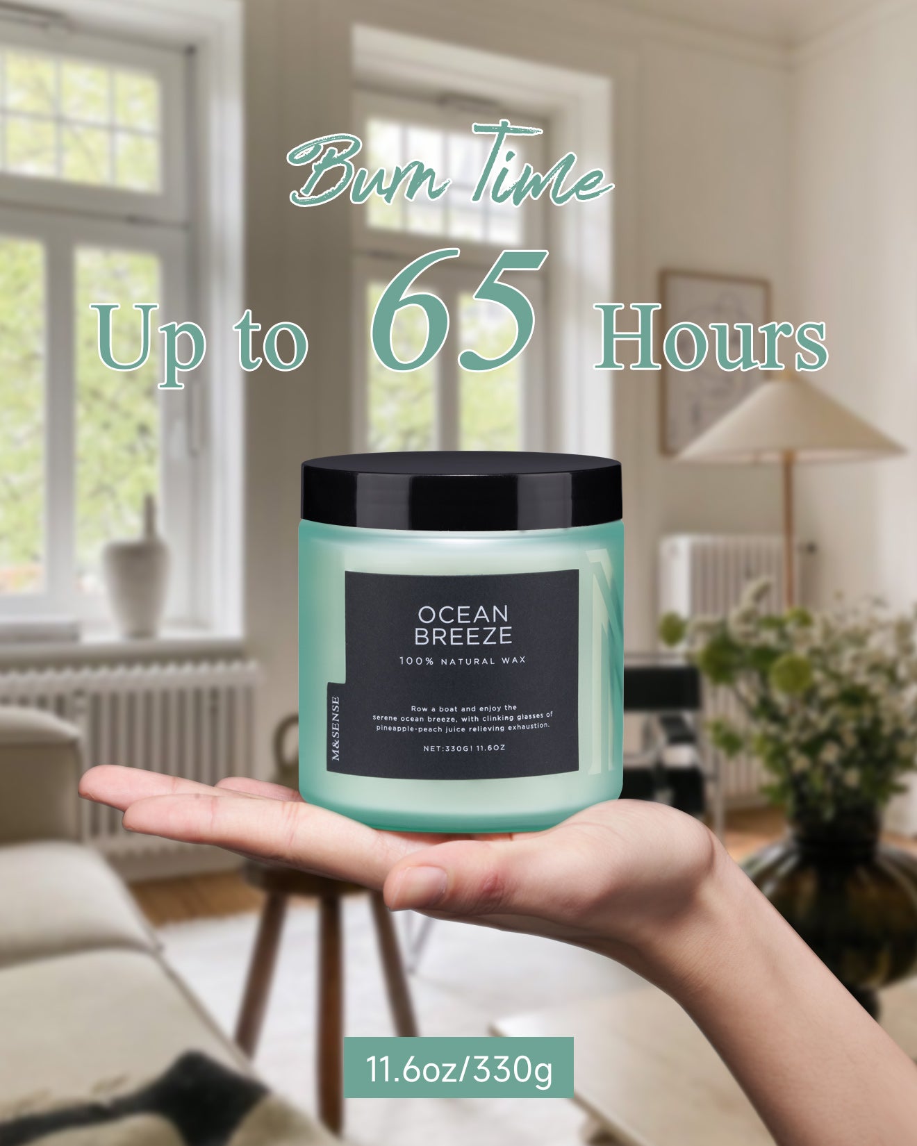Candle with a label held by hands against a room background, featuring text about burn time and weight.