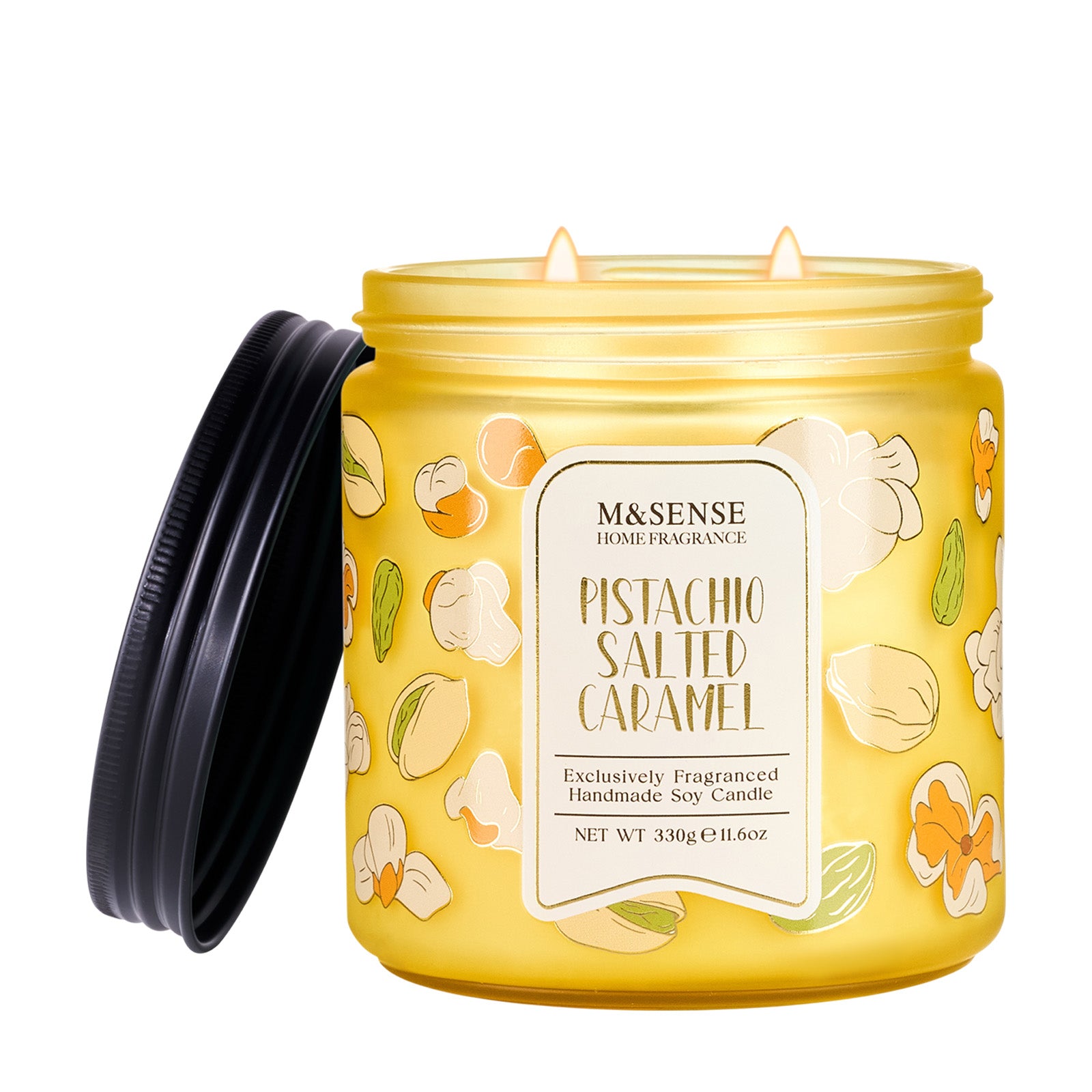 Yellow candle jar with 'Pistachio Salted Caramel' fragrance on a white background