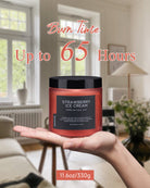 Hand holding a Strawberry Ice Cream scented candle with a long-lasting burn time.