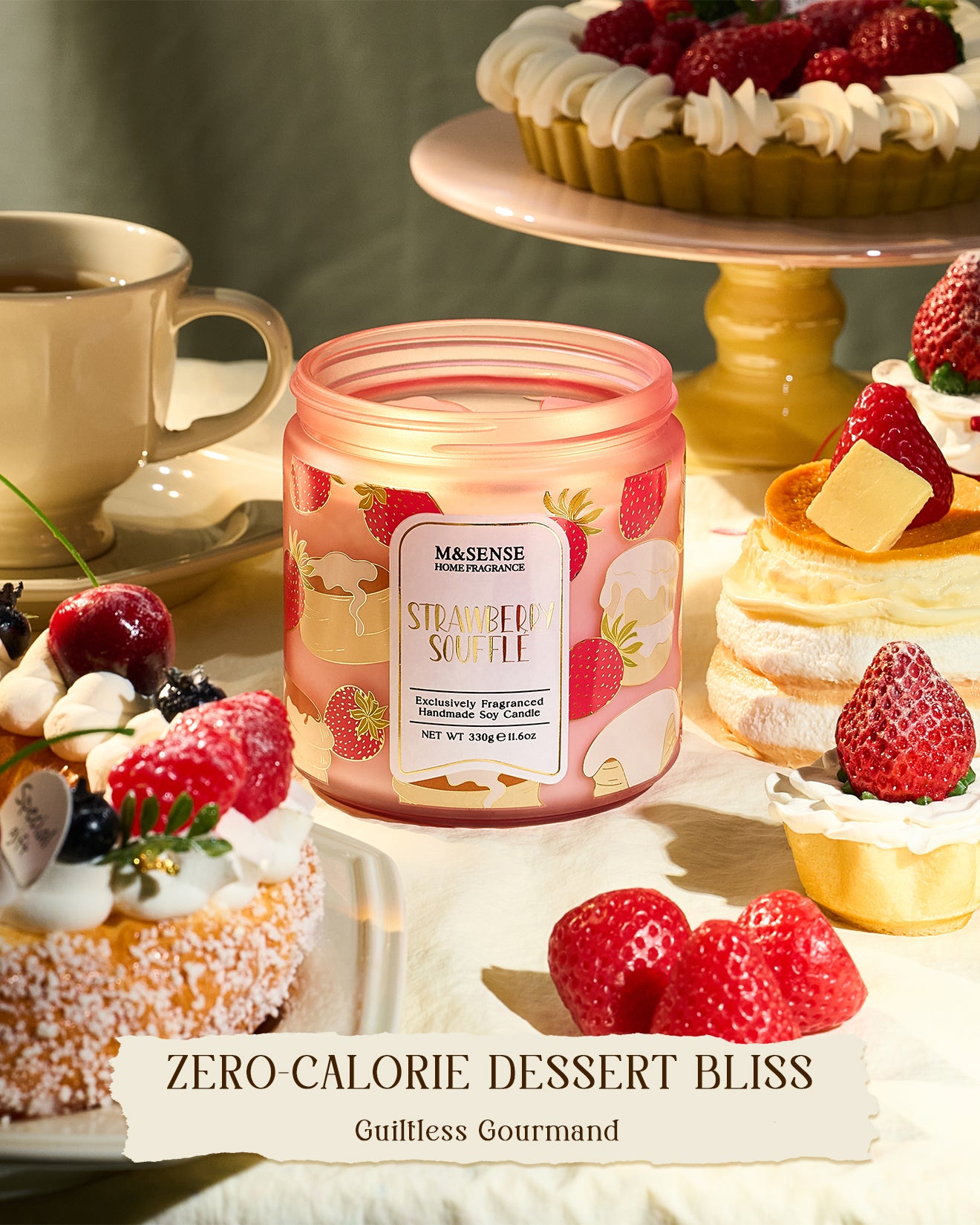 Candle with strawberry design surrounded by desserts and a cup on a light background