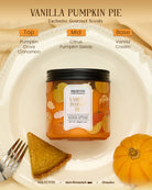 Vanilla pumpkin pie candle with ingredients listed on a plate with a slice of pie and pumpkin.