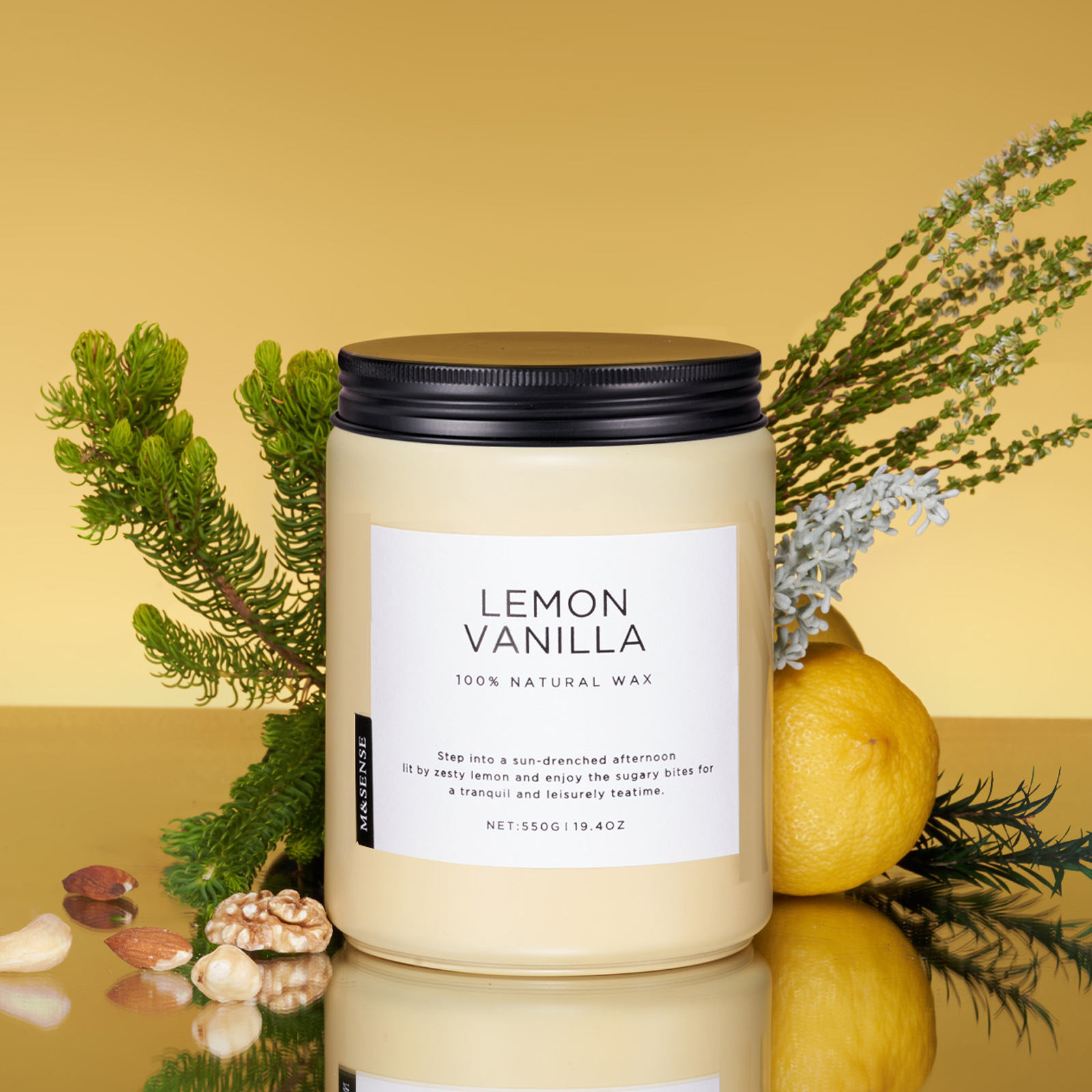 Candle labeled 'Lemon Vanilla' with natural elements on a reflective surface and yellow background