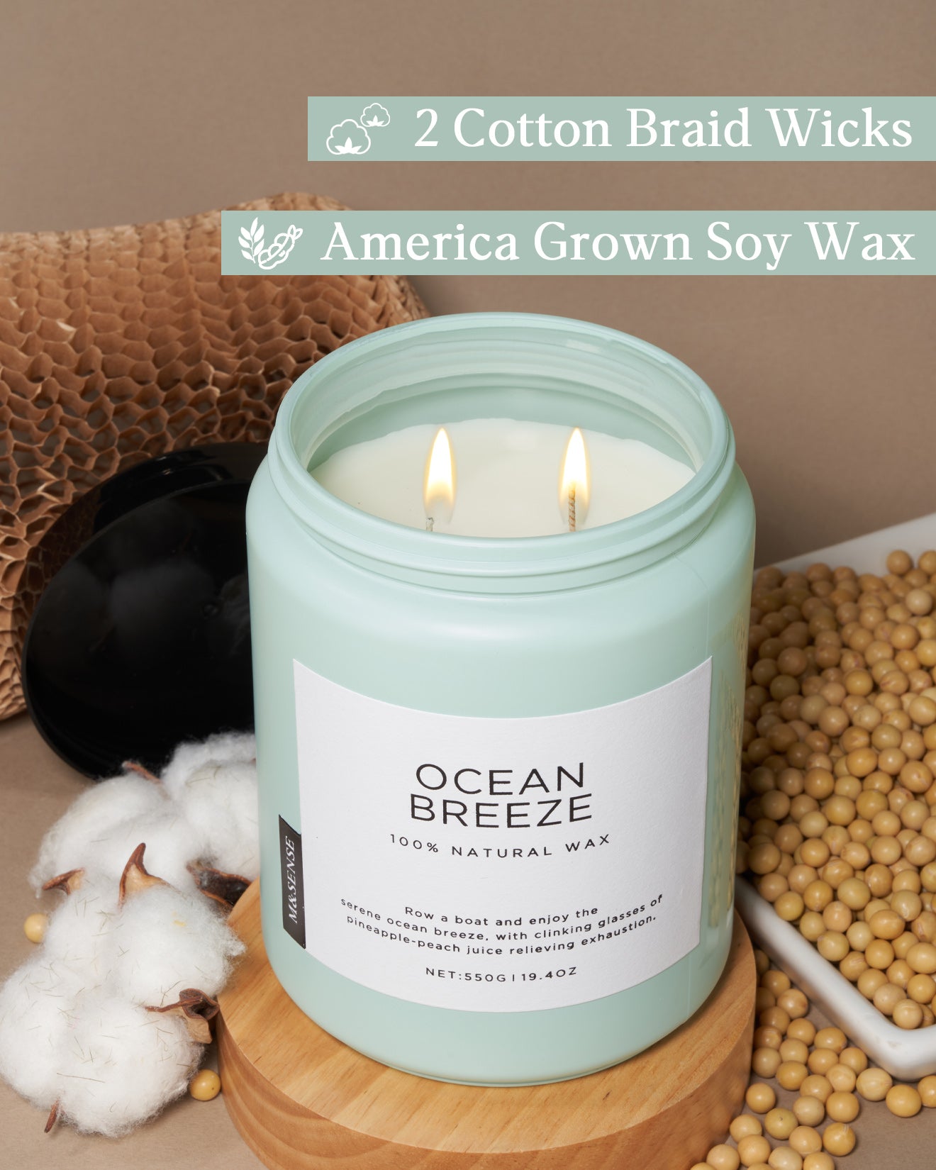 Ocean Breeze candle with soy wax and cotton wick, shown with cotton, soybeans, and recyclable packaging.