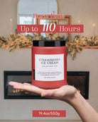 Strawberry Ice Cream scented candle held in a palm, showcasing its 110-hour maximum burn time.