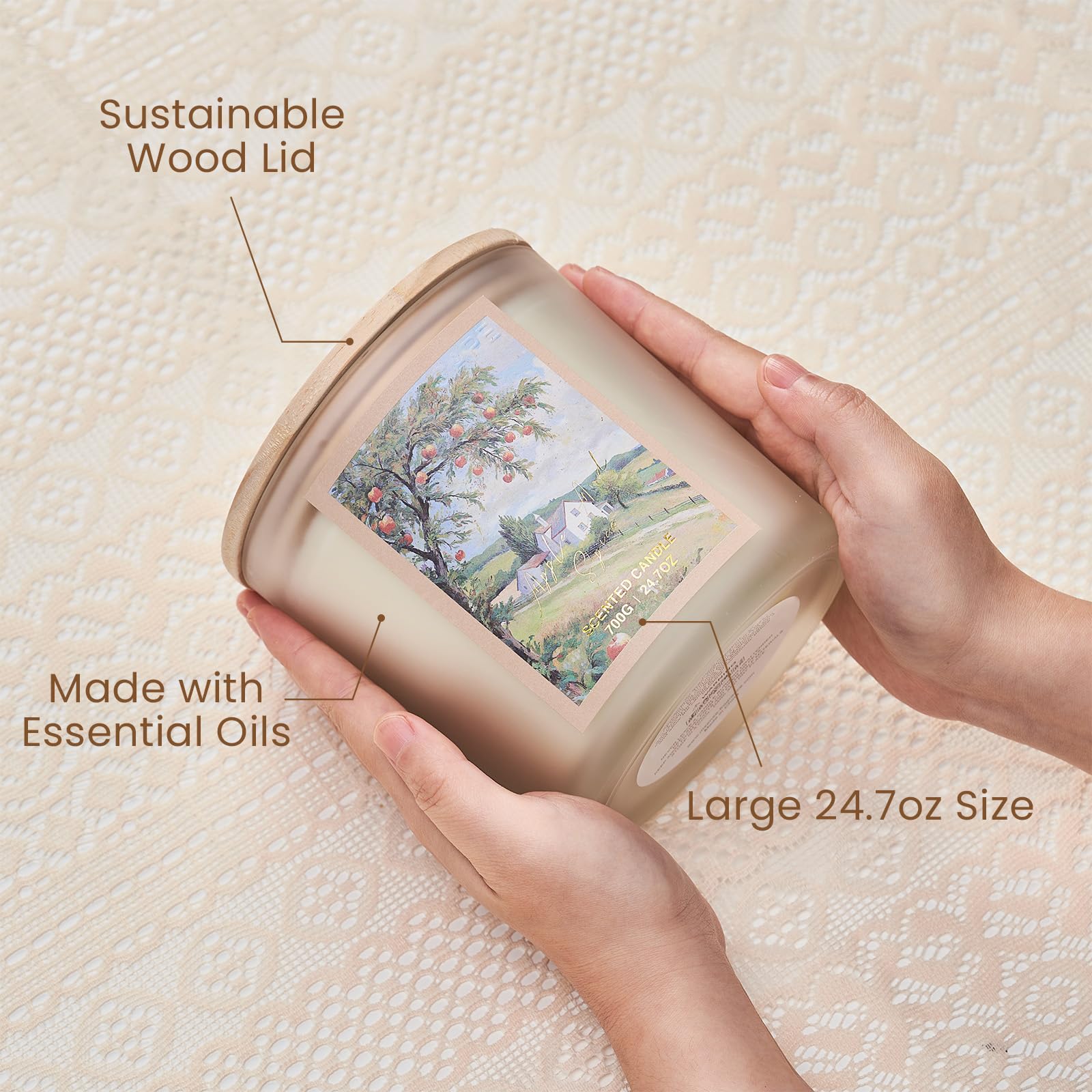 Hand holding a large 24.7oz size container with sustainable wood lid and essential oils, on a textured beige background.