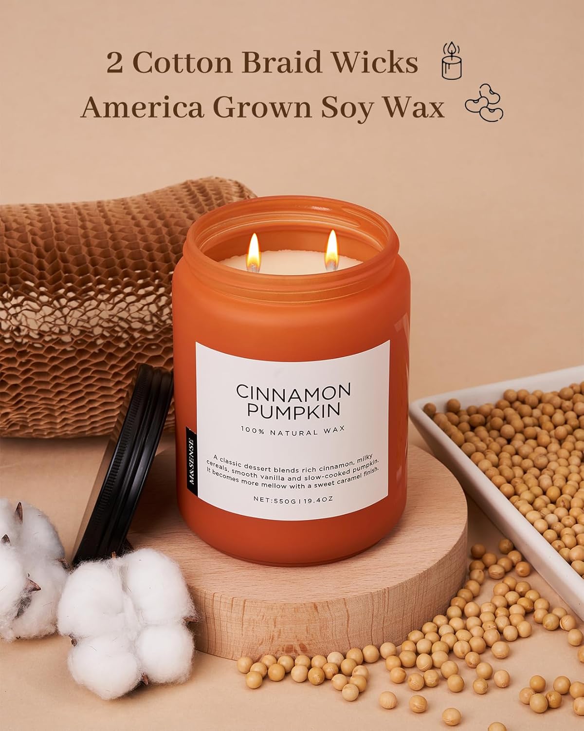Cinnamon pumpkin candle with cotton braid wicks and soy wax on a beige background