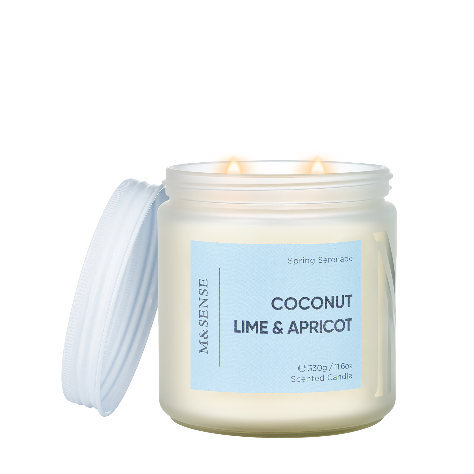 Candle jar labeled 'Coconut Lime & Apricot' with a blue label on a white background
