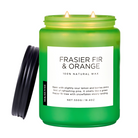 Green candle with a label on a white background