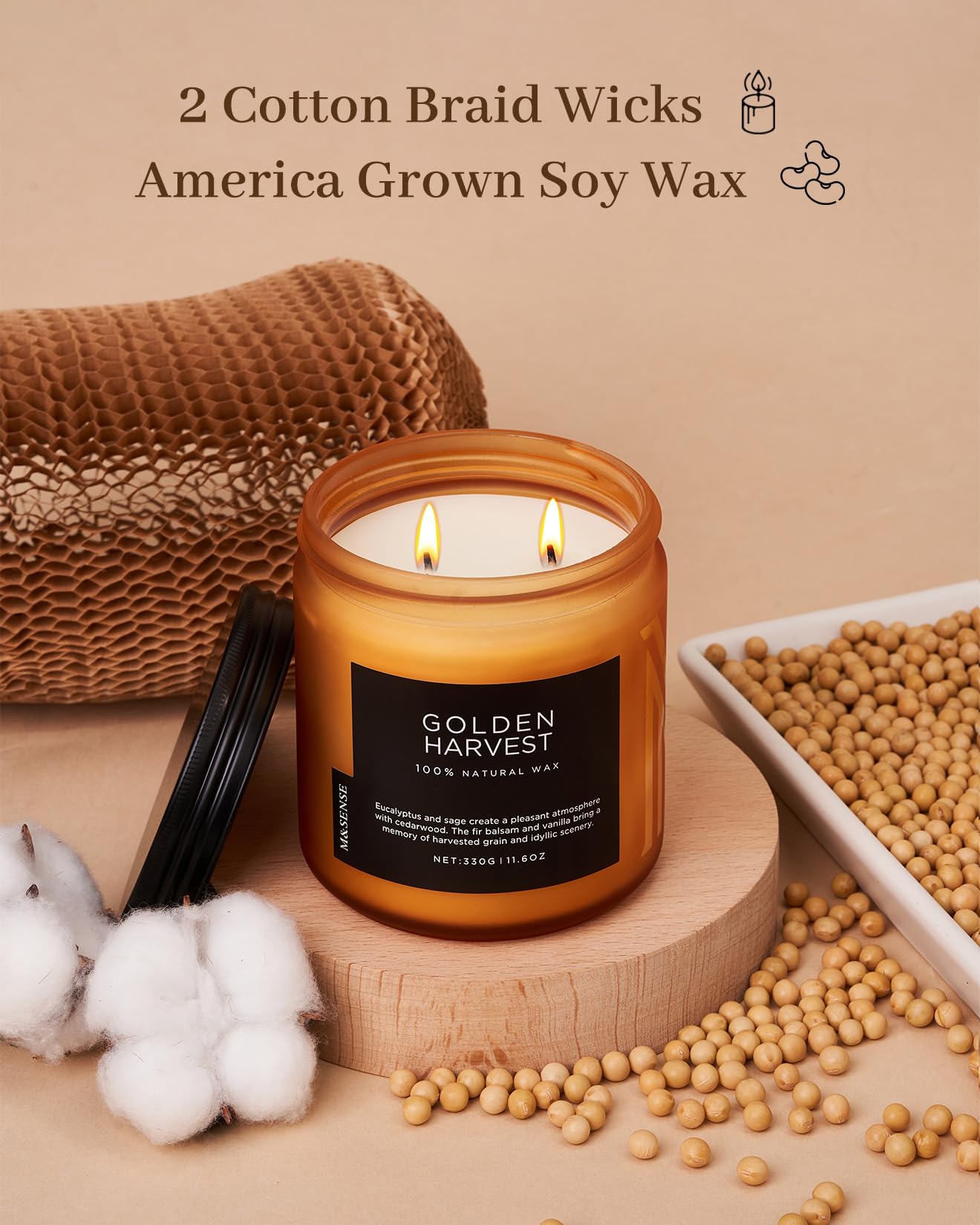 Scented candle with 'Golden Harvest' label on a wooden stand, surrounded by cotton and soybeans, with text about wicks and wax quality.