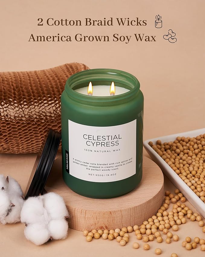 Green candle labeled 'Celestial Cypress' with cotton braid wicks and soy wax on a beige background