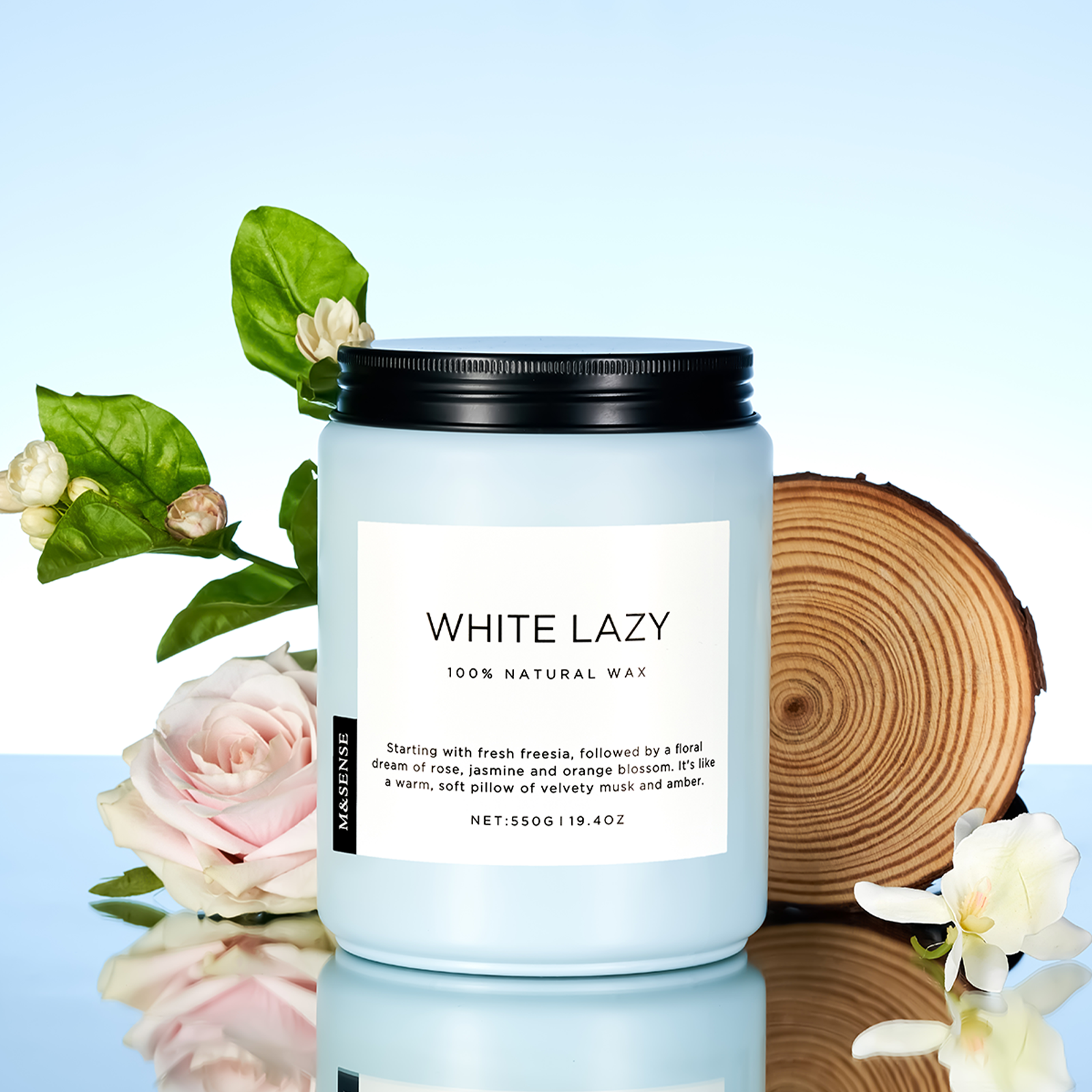 Candle labeled 'White Lazy' with floral and wooden background