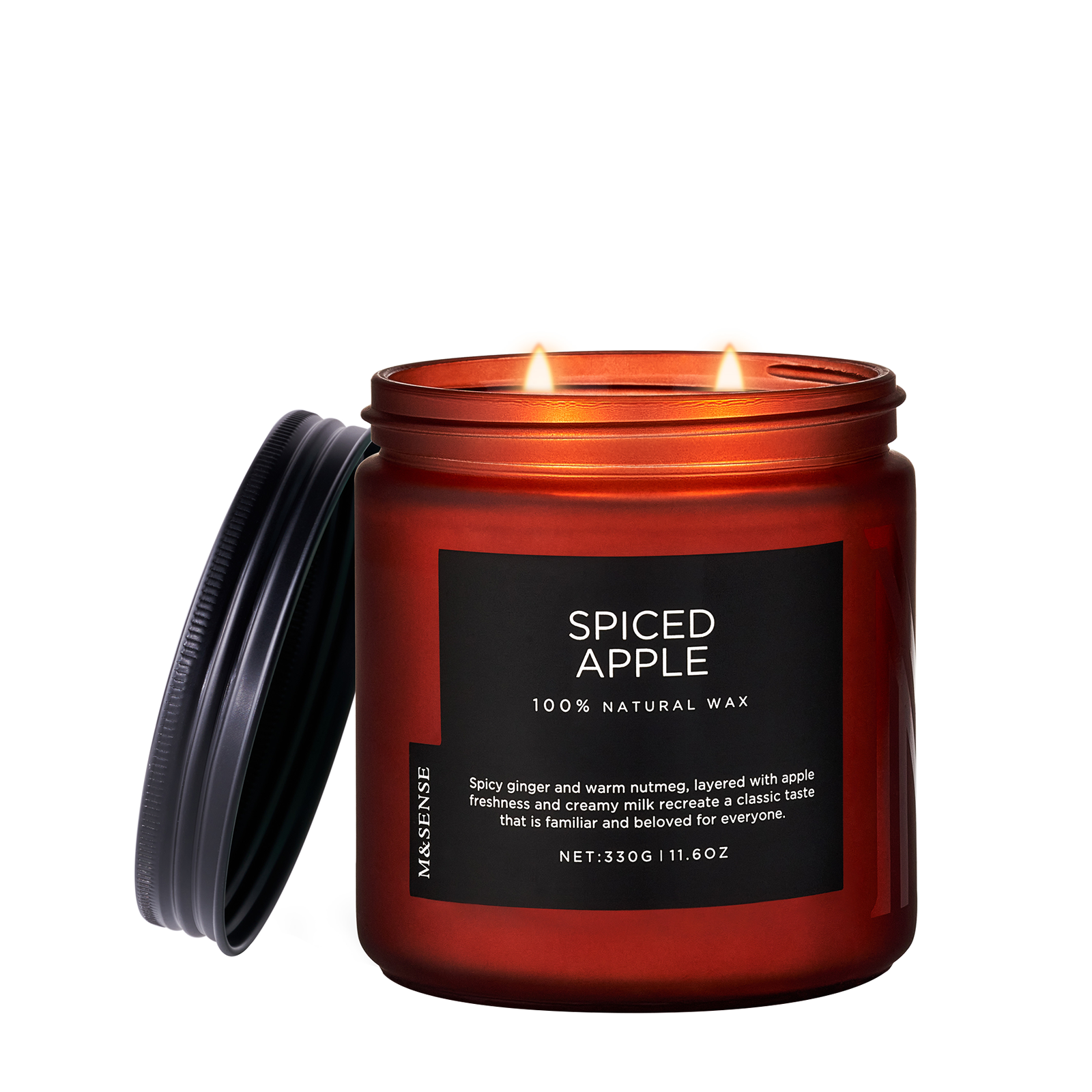 Spiced Apple candle in a amber jar with a black label on a white background