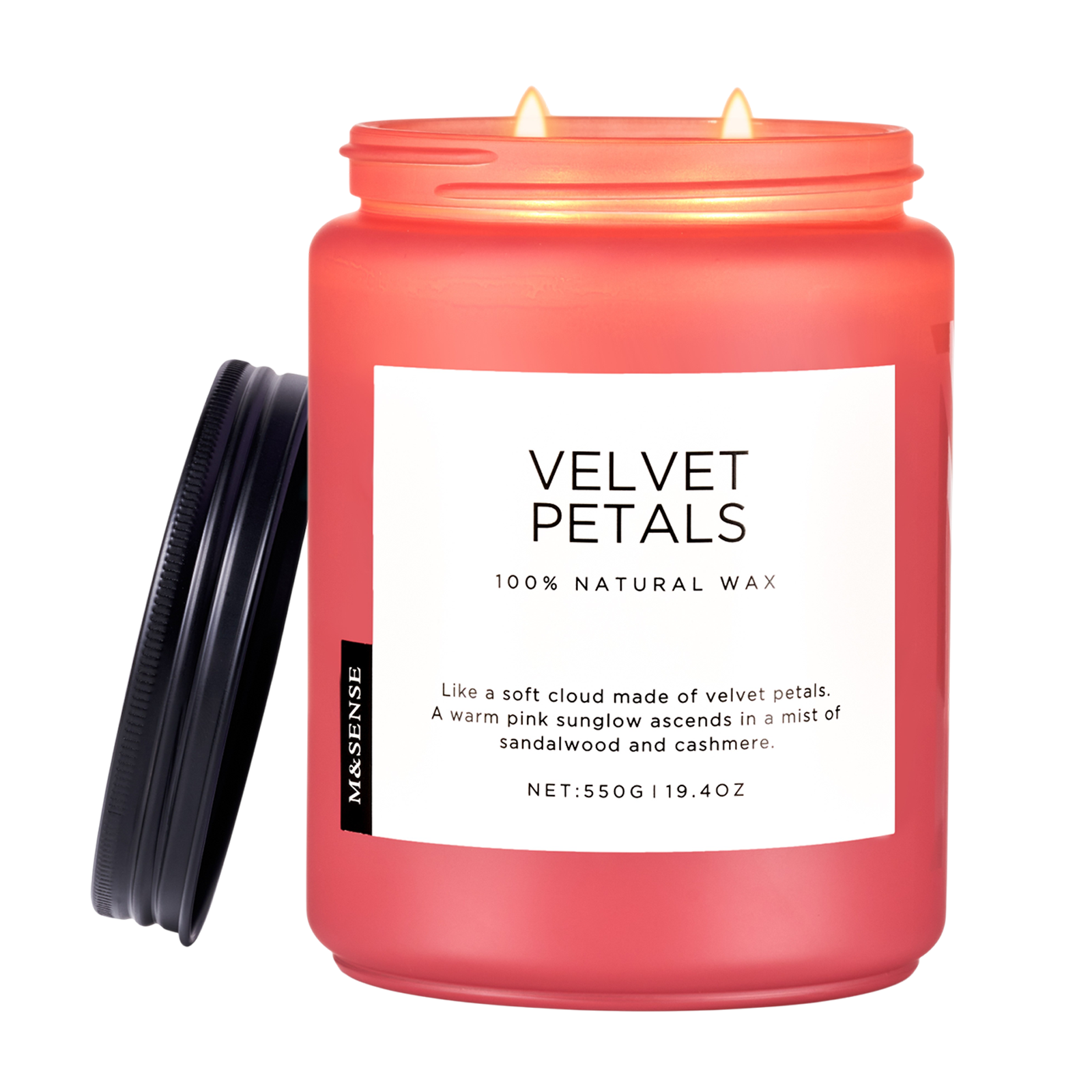 Pink candle labeled 'Velvet Petals' with a black lid on a white background