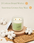 White candle labeled 'White Gardenia' with cotton bolls and soybeans on a light background